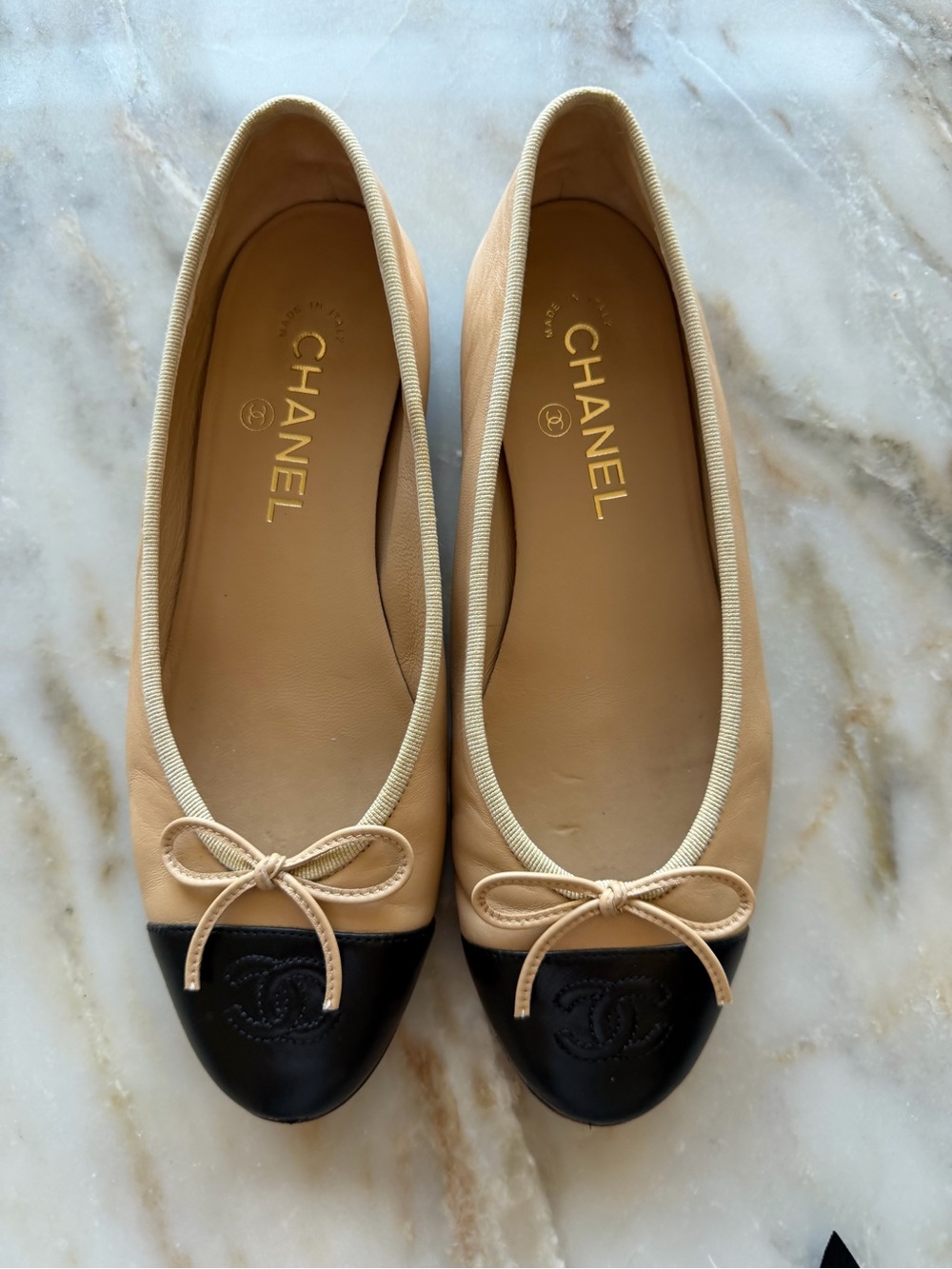 CHANEL Beige and Black Leather Cap-Toe Ballet Flats